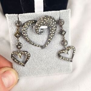 Lovely marcasite and sterling silver pendant and earrings.
